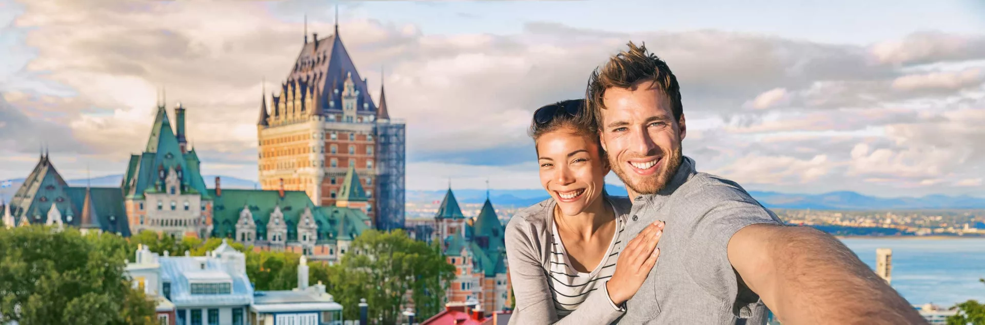 A couple capturing a selfie while moving from Ontario to Quebec.
