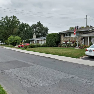 A Google Street View of a house with cars parked in front of it in Nepean.