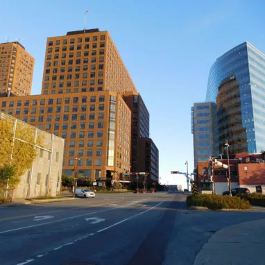A city street with tall buildings in the background, perfect for impressing Gatineau movers.