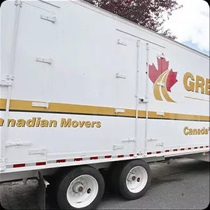 A moving truck with the logo and branding "Great Canadian Movers" parked on the street, captured in vivid images.
