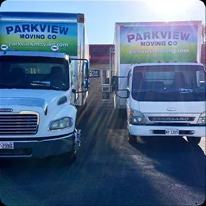 Two parkview moving co. trucks parked side by side in photos.
