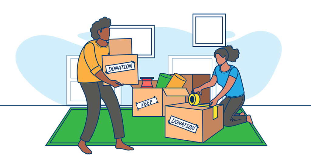 Two people organizing items into Keep and Donation boxes during a downsizing process for a home move.