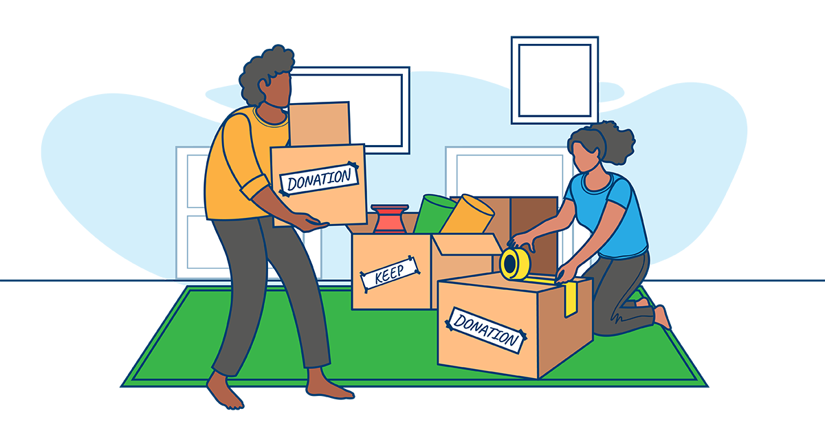 Two people organizing items into Keep and Donation boxes during a downsizing process for a home move.