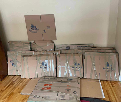 Family pictures carefully wrapped, taped, and protected for a secure local move in Ottawa by Parkview Moving Co.