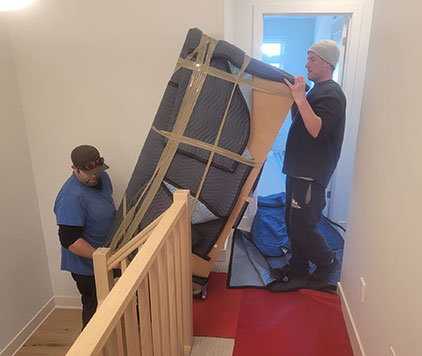 Furniture and floors are carefully protected during a local Ottawa move by Parkview Moving Co.