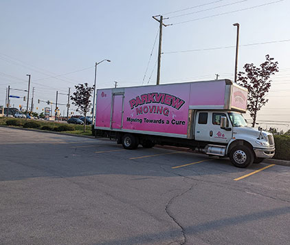 Parkview Moving Co.'s long-distance moving trucks en route to Toronto, Halifax, and Newfoundland, offering flexible moving options.