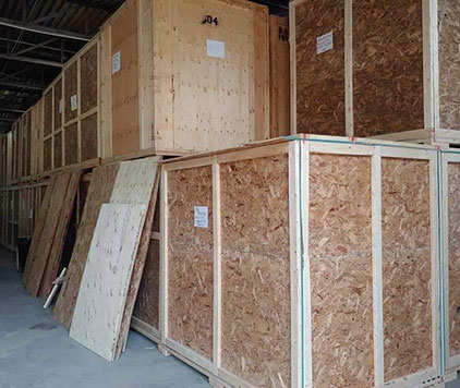 Large wooden crates stacked in Parkview Moving’s safe and secure warehouse storage in Ottawa.