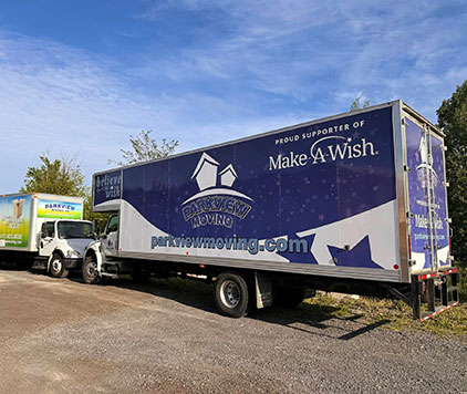 Parkview Moving Co. proudly featuring a Make-A-Wish sponsorship banner, supporting community initiatives.