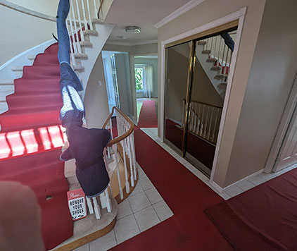 Well-protected floor, banister, and stairway during a local move in Ottawa by Parkview Moving Co.