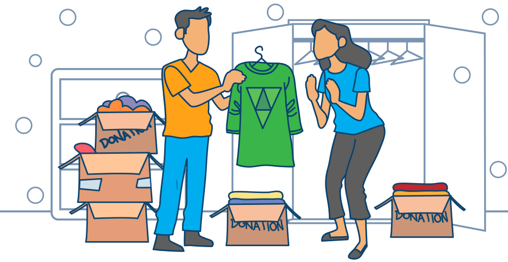 Two people diligently sort clothes for donation in a room filled with boxes, spreading goodwill through decluttering.
